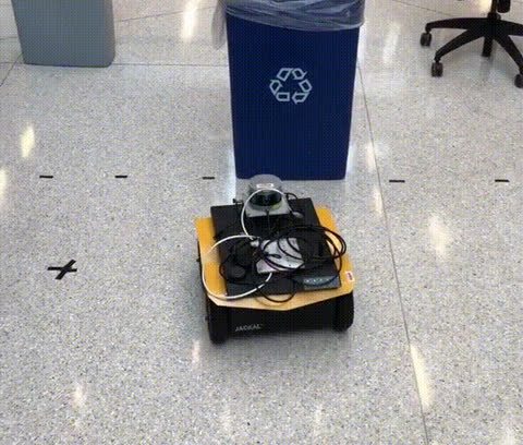 Clearpath Jackal robot avoiding an obstacle